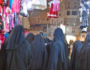 Yemeni women rushing through the souk during Ramadan....